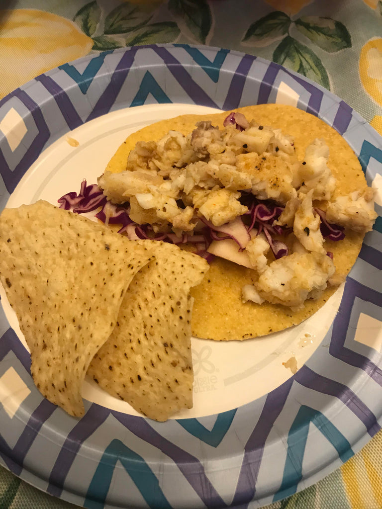 Fish tacos with a cabbage and apple slaw